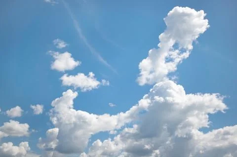 White fluffy clouds background. Stock Photos