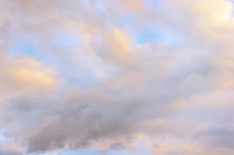 White fluffy clouds background. Stock Photos