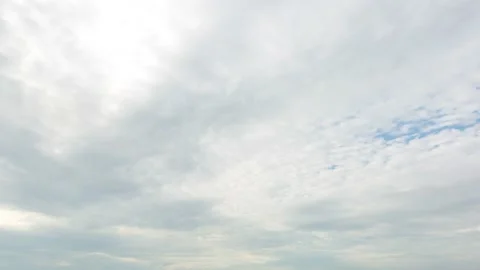 White fluffy clouds beautifully floating in the blue sky, timelapse, 4k Stock Footage 133182836