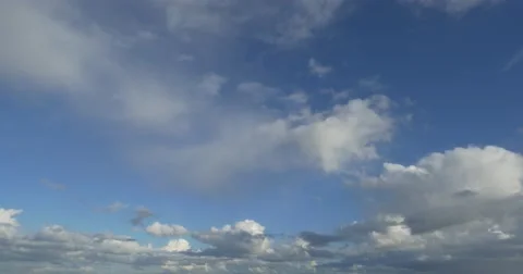 White fluffy clouds in the blue sky Stock Footage 50578880