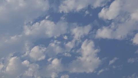 White fluffy clouds on a blue sky background Stock Footage 115606869
