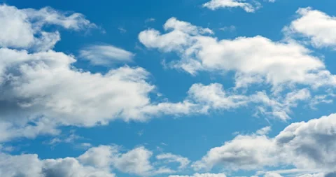 White fluffy clouds on blue sky. Beautiful sunny time lapse. Stock Footage 160908022