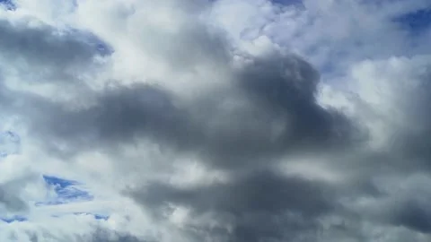White, fluffy clouds in blue sky. Видео 219696150