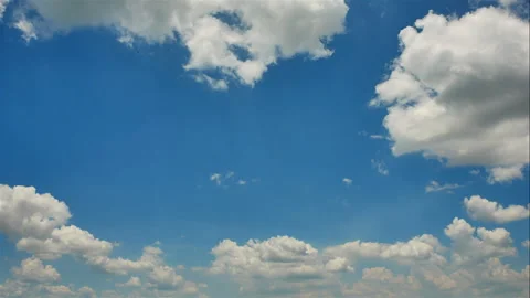 White fluffy clouds in the blue sky Stock Footage 246498209