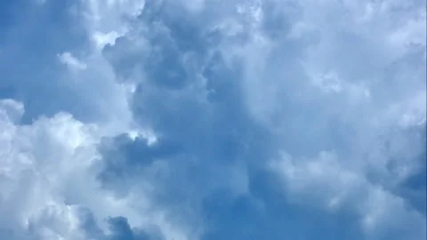 White fluffy clouds in the blue sky 스톡 동영상 263471202