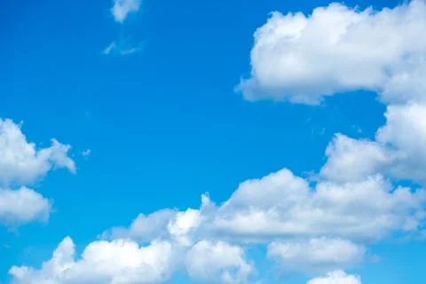 White fluffy clouds in the blue sky Foto stock