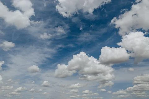 White, Fluffy Clouds In Blue Sky. Background From Clouds Stock Photos