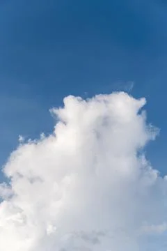 White fluffy clouds with blue sky Stock Photos