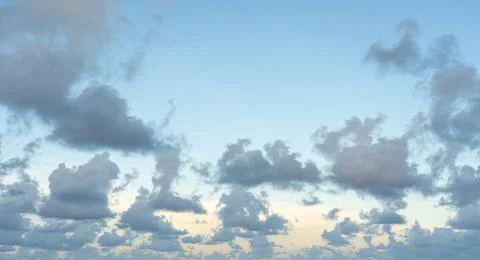 White, fluffy clouds in blue sky. Background from clouds Stock Photos