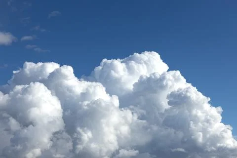White fluffy clouds in a blue sky Foto stock