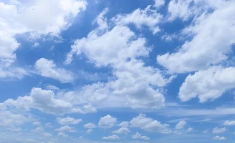 White fluffy clouds with blue sky on sunny day, beautiful summer cloudy sky.. Stock Photos