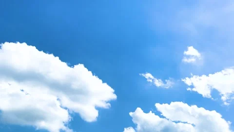 White Fluffy Clouds On Bright Blue Sky Background At The Temple Stock Footage 307706038