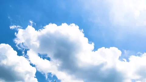 White Fluffy Clouds On Bright Blue Sky  With Little Bird Flying At The Temple Stock Footage 308807445