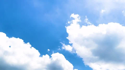 White Fluffy Clouds On Bright Blue Sky Background With Flocks Of Birds Flying Stock Footage 309291121