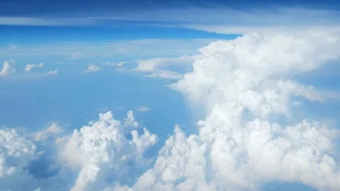 White fluffy clouds floating on the blue sky. Stock Footage 134122486