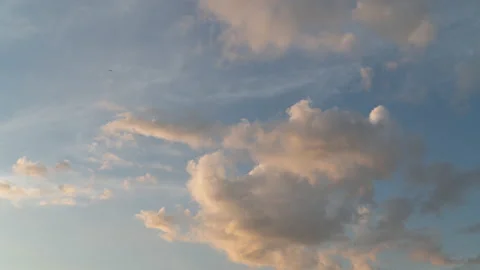 White fluffy clouds move in the blue sky Stock Footage 197513903