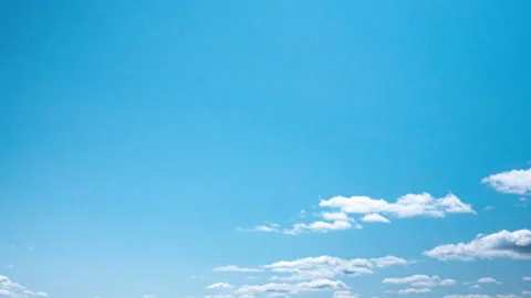 White Fluffy Clouds Moving Across Blue Sky Time-Lapse, Cumulus Clouds, Summer We Stock Footage 336462564