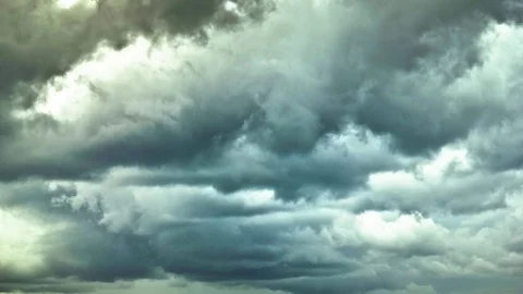 White fluffy clouds moving in sky Stock Footage 76105185