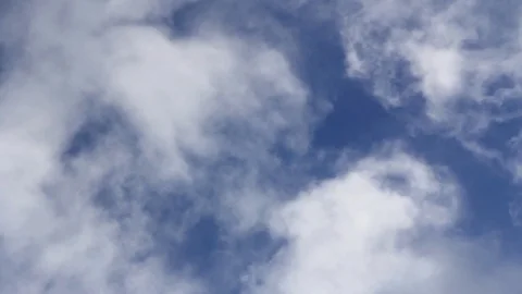 White Fluffy Clouds at normal speed Stock Footage 95116602