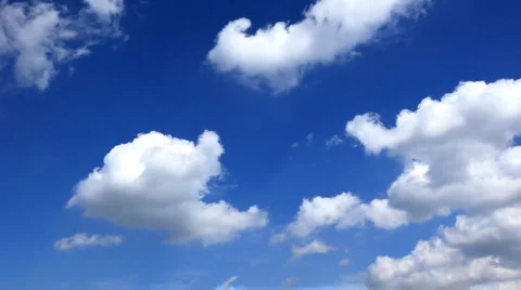 White fluffy clouds over blue sky Stock-Footage 940188