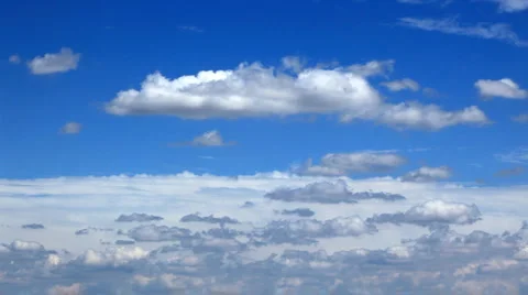 White fluffy clouds over blue sky Stock Footage 940238