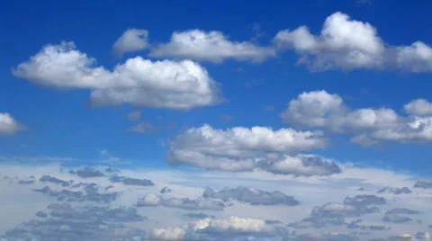 White fluffy clouds over blue sky Stock Footage 940271