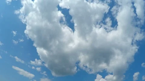 White Fluffy Clouds over Blue Sky Stock Footage 53158570