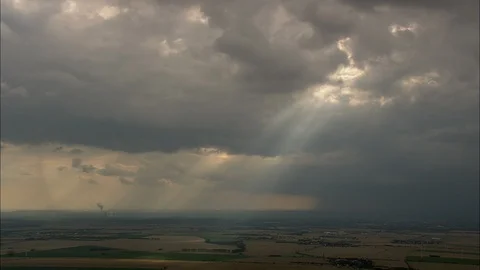 White fluffy clouds over green landscape, Dramatic Clouds - Fingers Of God Stock Footage 108617166