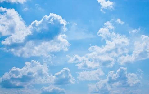 White fluffy clouds Stock Photos