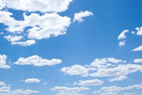White fluffy clouds Stock Photos