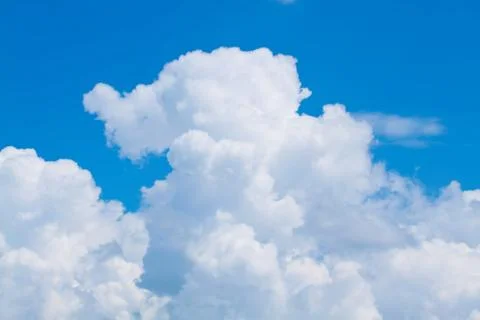 White fluffy clouds Stock Photos