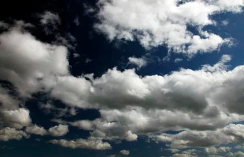 White fluffy clouds Stock Photos