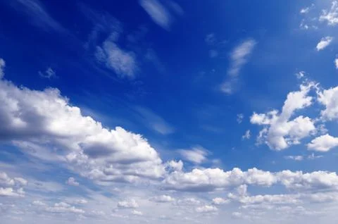 White fluffy clouds Stock Photos
