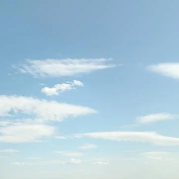 White fluffy clouds Stock Photos