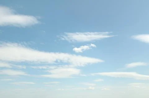 White fluffy clouds Stock Photos