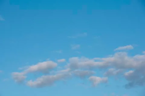 White fluffy clouds Stock Photos