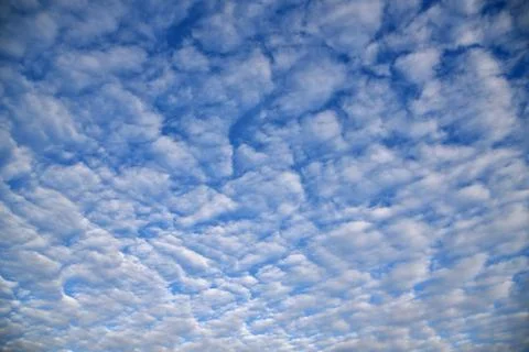White fluffy clouds Stock Photos