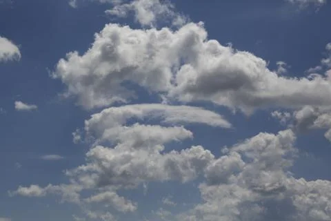 White fluffy clouds Stock Photos