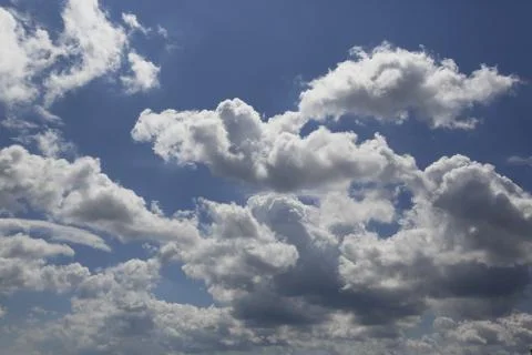 White fluffy clouds Stock Photos