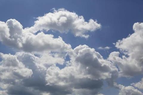 White fluffy clouds Stock Photos