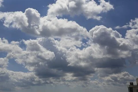 White fluffy clouds Stock Photos