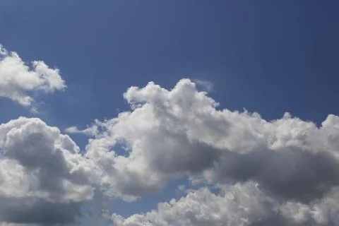 White fluffy clouds Stock Photos