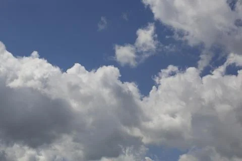 White fluffy clouds Stock Photos