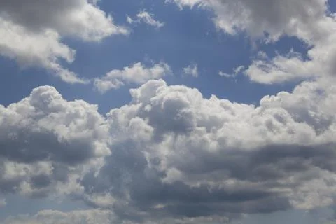 White fluffy clouds Stock Photos