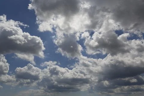 White fluffy clouds Stock Photos