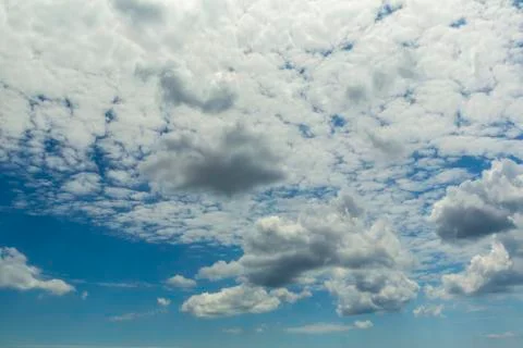White fluffy clouds . Stock Photos