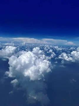 White fluffy clouds Stock Photos