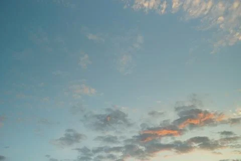 White fluffy clouds in the sky. Blue sky and cloud cover on a sunny summer da 写真素材