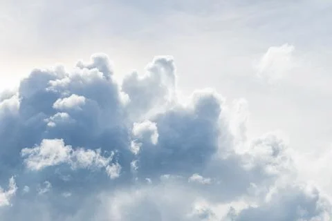 White fluffy clouds in the sky Stock Photos