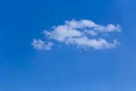 White fluffy clouds in the sky. Stock Photos